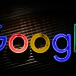 the google logo lit up in the dark