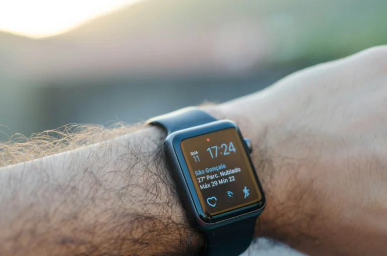 a wrist with a smart watch on it