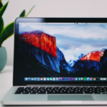 Apple’s macbook laptop on a table