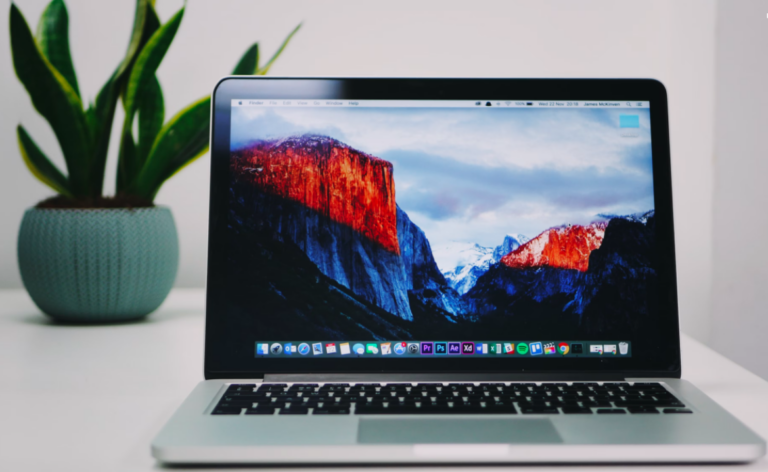 Apple’s macbook laptop on a table